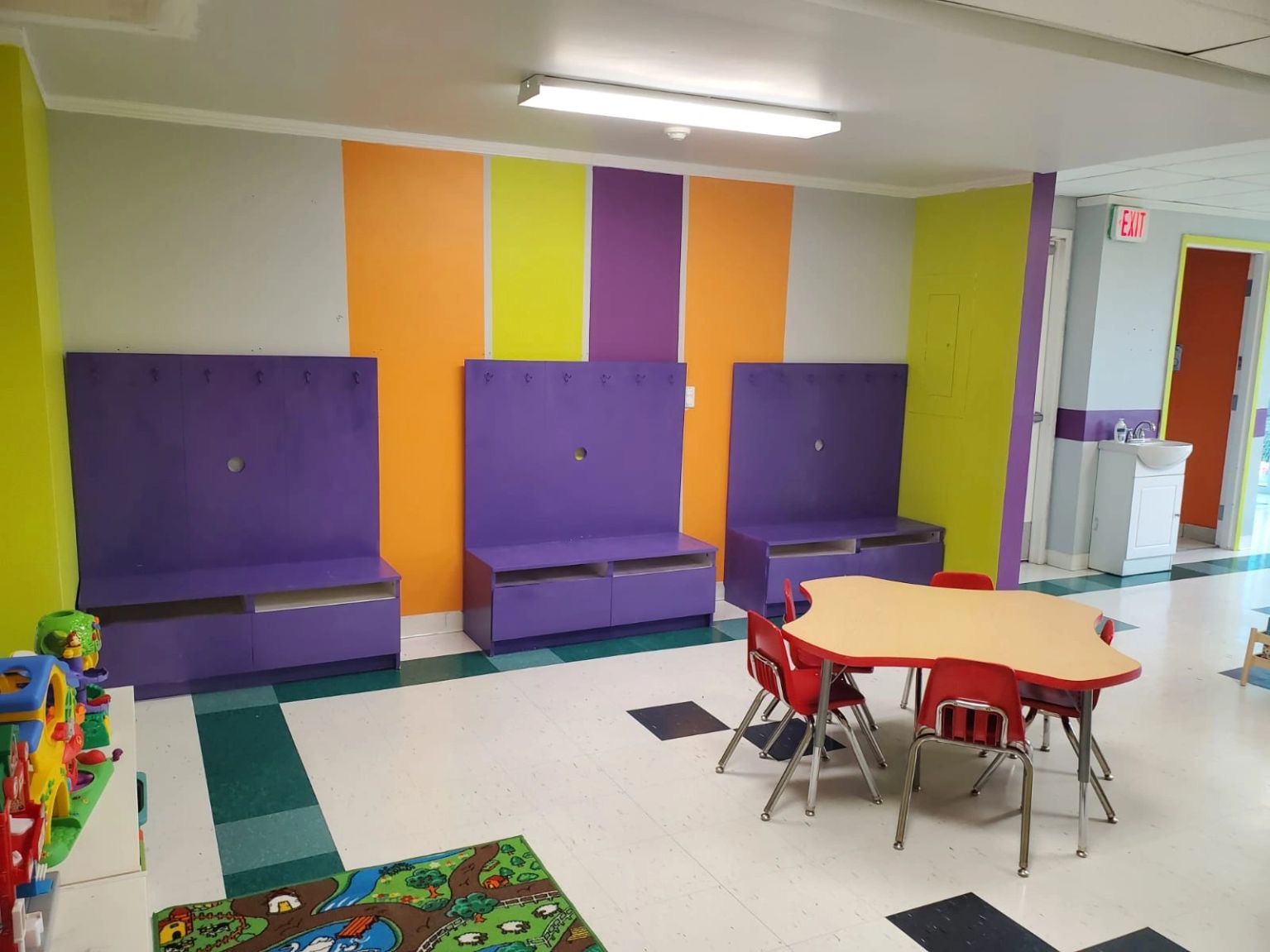 Kanata classroom with child-sized tables and colourful seating.